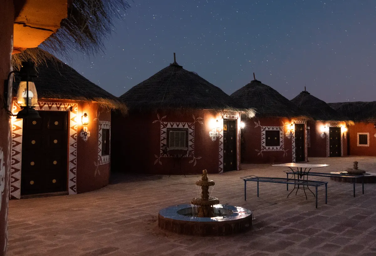 Candle lit poolside dining setup