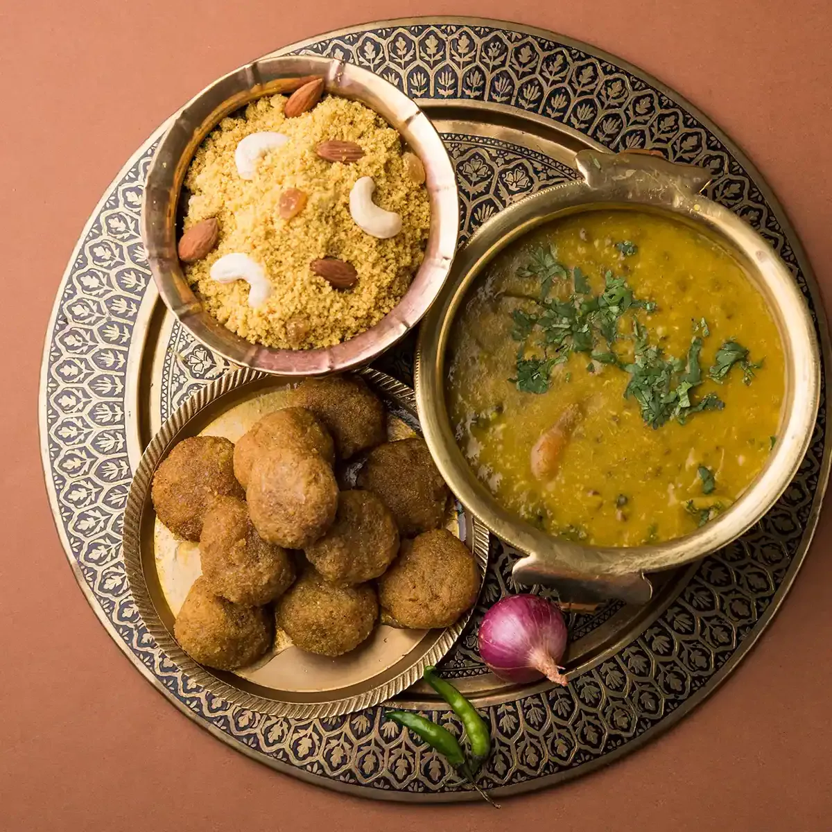 Assorted Rajasthani thali dishes served in bowls