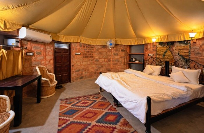 Family Heritage Suite with two large beds and colourful rugs